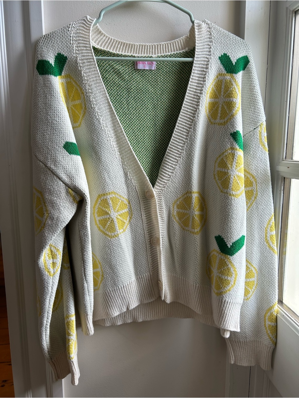 Pink Lily Cream Cardigan with Yellow Lemon Motif and Green Leaf Accents